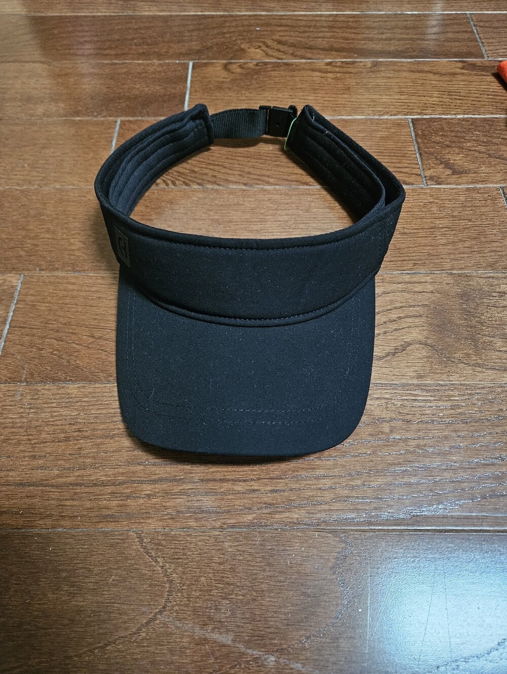 Cole Haan Black Visor with Quick-Release Buckle